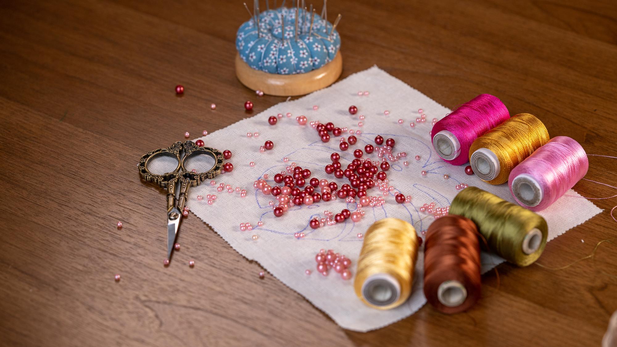 selection of embroidered samples on table